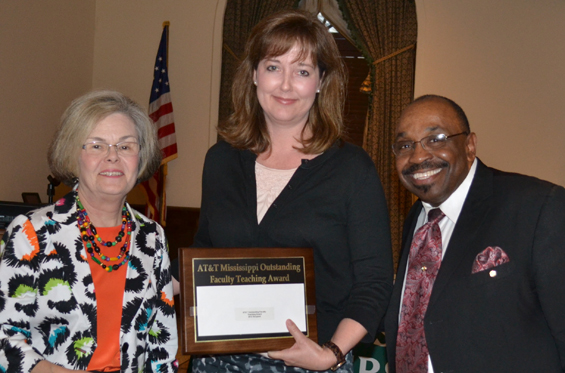 Dr. Michelle Matthews with Provost and Vice President of Academic Affairs Dr. Ann Lotven (left) and College of Business Dean Dr. Billy Moore (right).